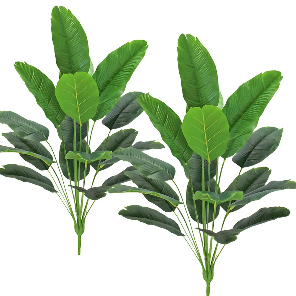 Artificial Bird of Paradise plant with large green leaves and stems