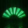 An illuminated folding hand fan with LED lights showing a green, radiating pattern against a dark background.