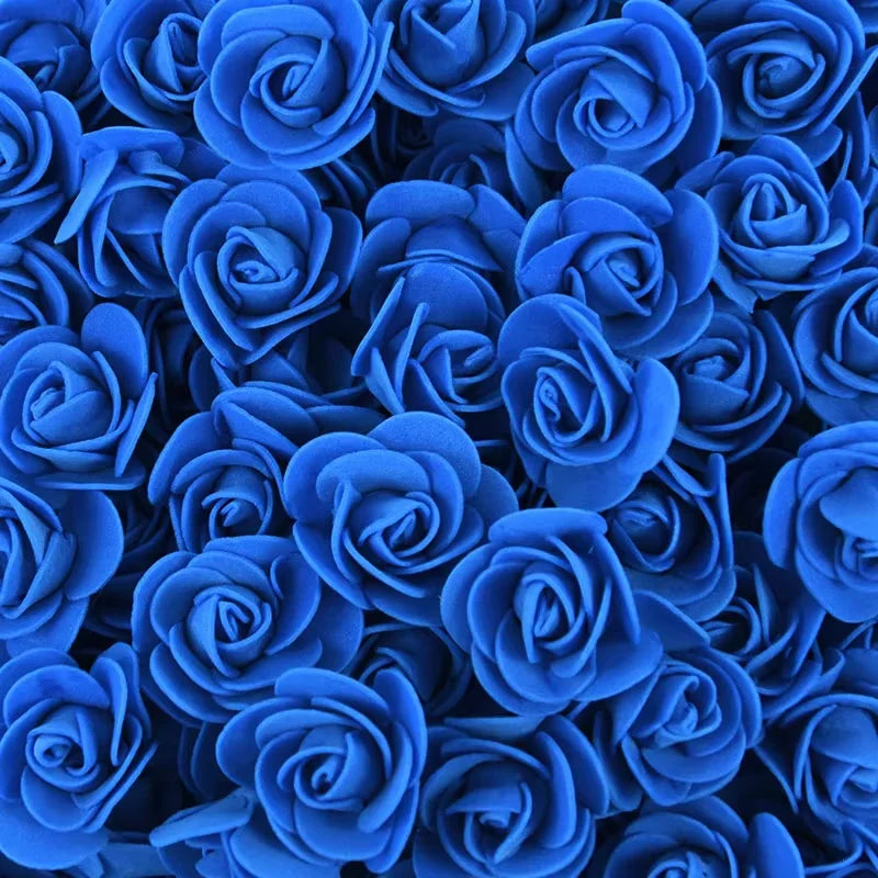 A bulk pack of realistic blue foam rose flowers for weddings and events.