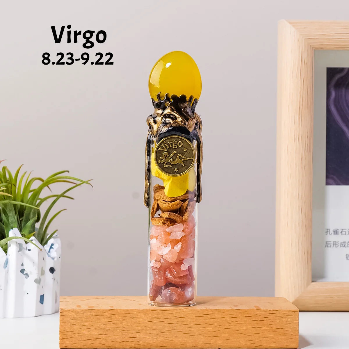 A glass bottle filled with raw healing stones and topped with a yellow crystal, representing Virgo zodiac sign.