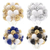 A collection of balloon bouquets featuring white, gold, silver, and blue balloons with metallic pearl confetti accents.