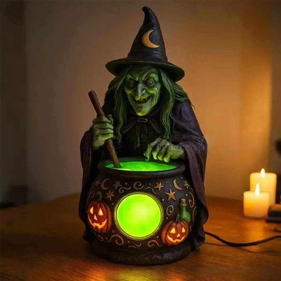 A dark green witch ghost figurine with a pointed hat sits atop a glowing green lantern.