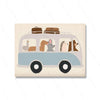 A light blue vintage van decorated with various cute animals like a turkey, a donkey, and a bear.