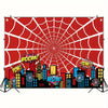 A red and white spiderweb design featuring a city skyline silhouette with various exclamation words.