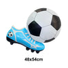 A white and black soccer ball is shown next to a blue and white football-themed boot.