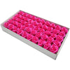 A rectangular box filled with numerous pink artificial rose heads for wedding and party decor.