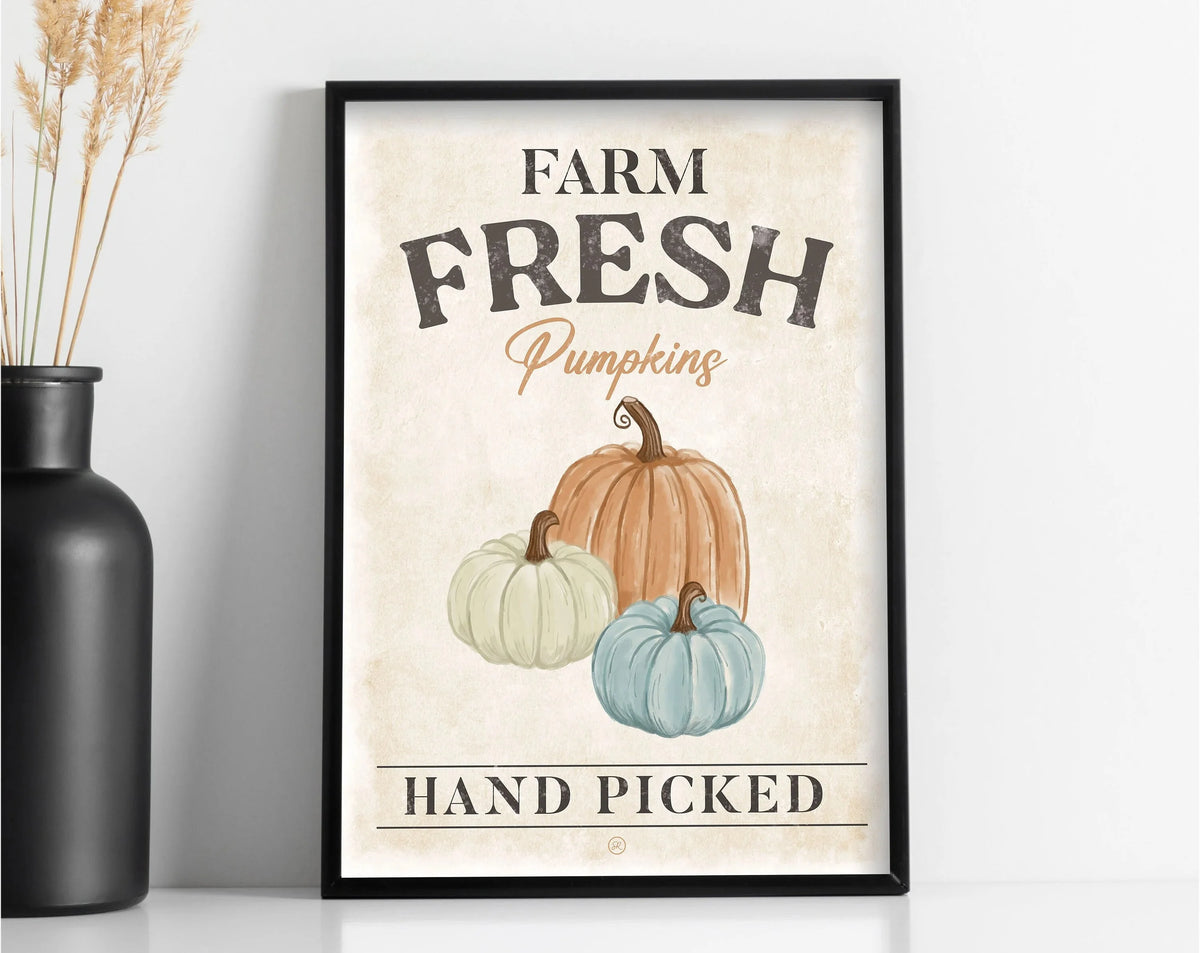 Farm fresh hand picked pumpkins art poster featuring a large orange pumpkin and a smaller green one.