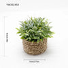 Artificial potted plant with green foliage in a woven natural fiber pot.
