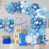 A blue latex balloon garland featuring various shades of blue and silver balloons arranged in an arch shape.
