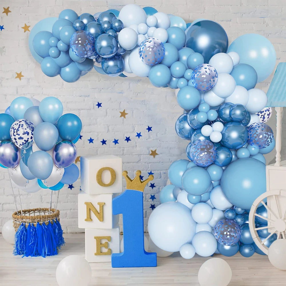 A blue latex balloon garland featuring various shades of blue and silver balloons arranged in an arch shape.