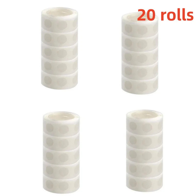 Un juego de 20 rollos de pegatinas de puntos adhesivos reutilizables para decoración de globos en blanco.
