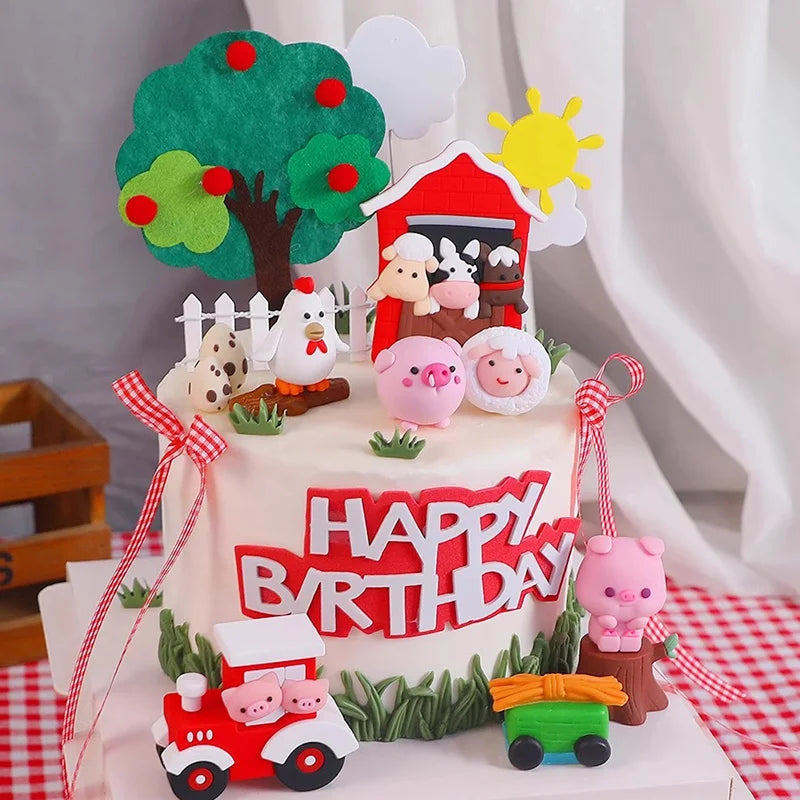 A tiered cake decorated with farm animal toppers including a tree, pig, sheep, and various animals for a birthday party.