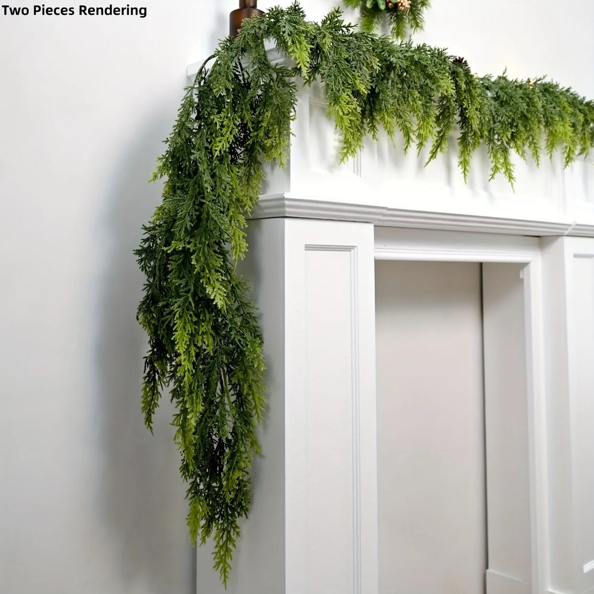 Extra long pine vine wreath draped over a white mantelpiece