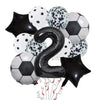 A set of black and white patterned football shaped helium foil balloons and a large black number two balloon for birthday dec