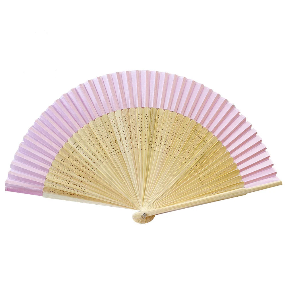 Elegant bamboo folding fan with pink and natural wood stripes shown open and angled