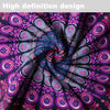 Close-up of a dark fabric with vibrant purple and pink peacock mandala patterns rolled into a swirl.