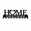 Black metal key holder with a heart shape and the words sweet home, featuring wall mounted hooks.