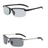 A pair of black photochromic polarized driving sunglasses with an alloy frame.