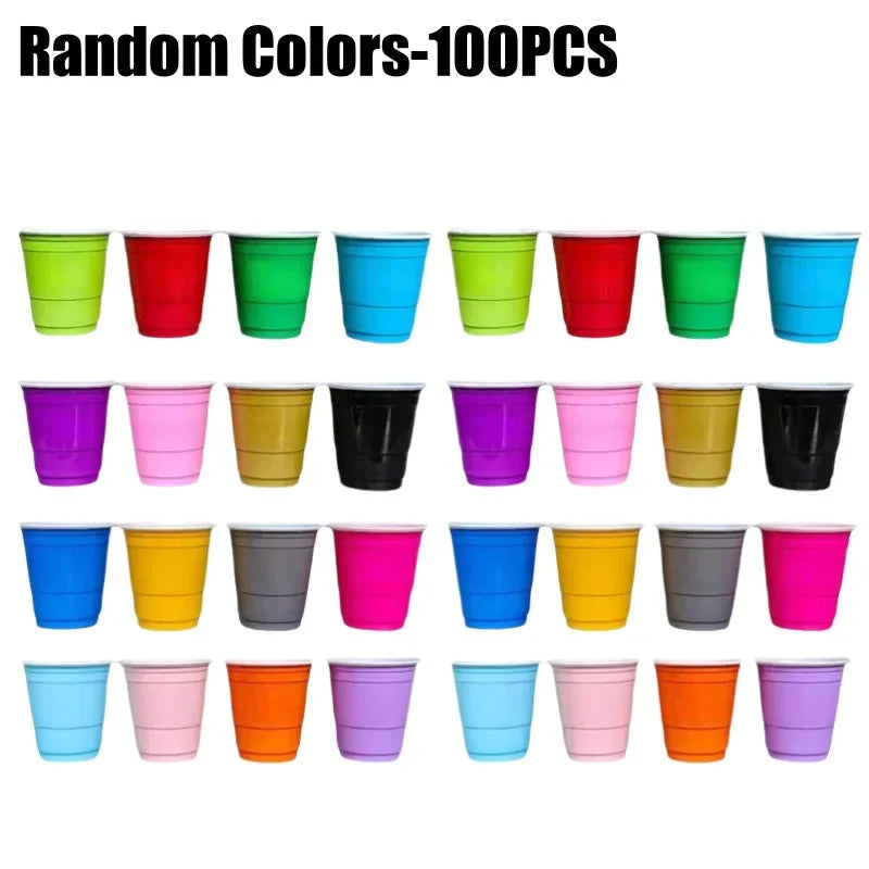 A collection of 100 disposable plastic shot cups in various random colors arranged in a single row.