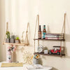 Rustic wooden hanging shelves with rope displaying various potted plants and decorative items.
