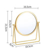 A round gold-colored metal makeup mirror with a stand, shown with dimensions.