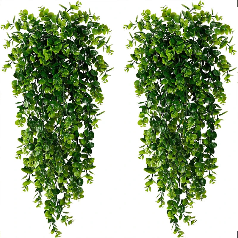 Two vertical strands of artificial eucalyptus hanging plants used for home decor