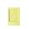 A square, pale yellow mini film frame for instant photos.