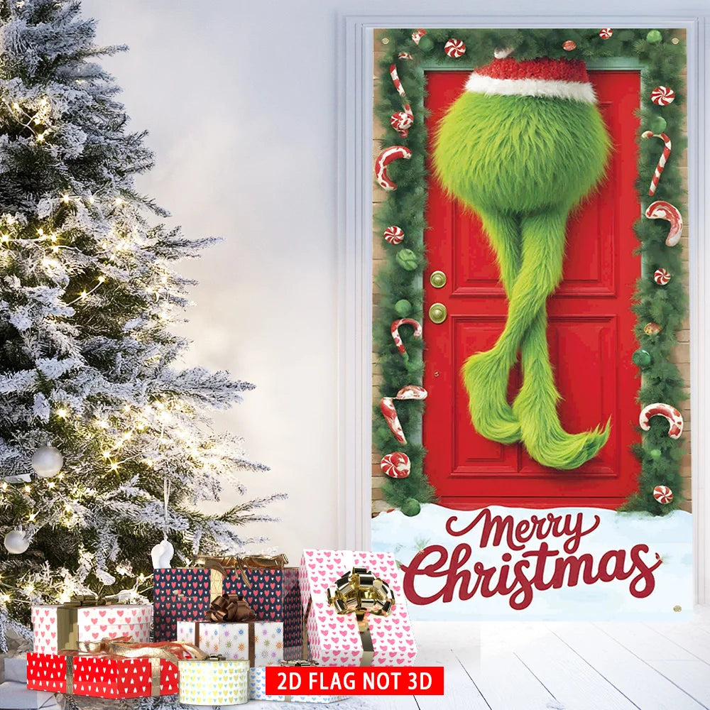 A festive red door cover flag featuring a bright green furry decoration and Christmas greenery.