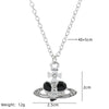 Silver pendant necklace featuring a diamond-inlaid Saturn design.