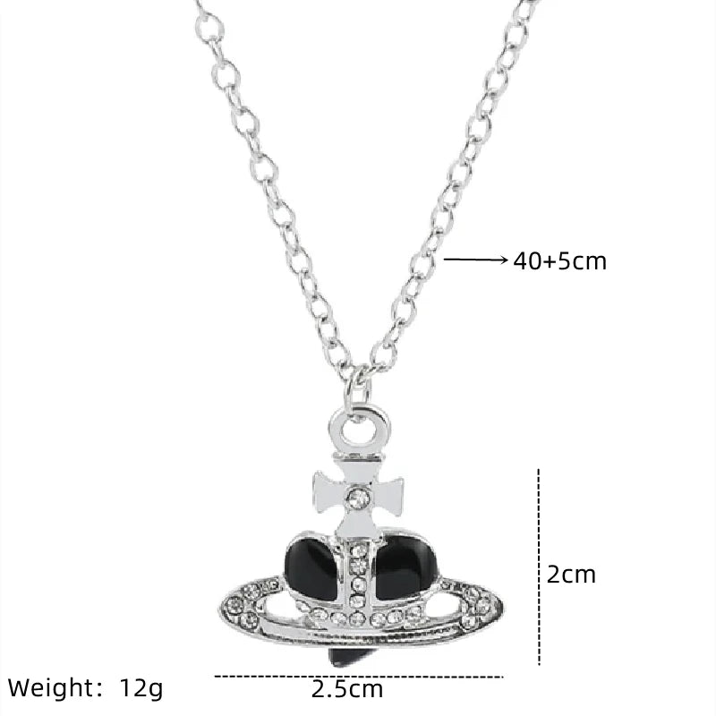 Silver pendant necklace featuring a diamond-inlaid Saturn design.