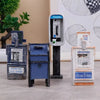 A collection of vintage-style miniature payphones, including a modern phone and an old telephone booth.