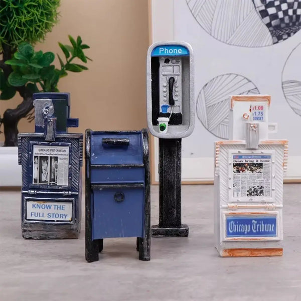 A collection of vintage-style miniature payphones, including a modern phone and an old telephone booth.
