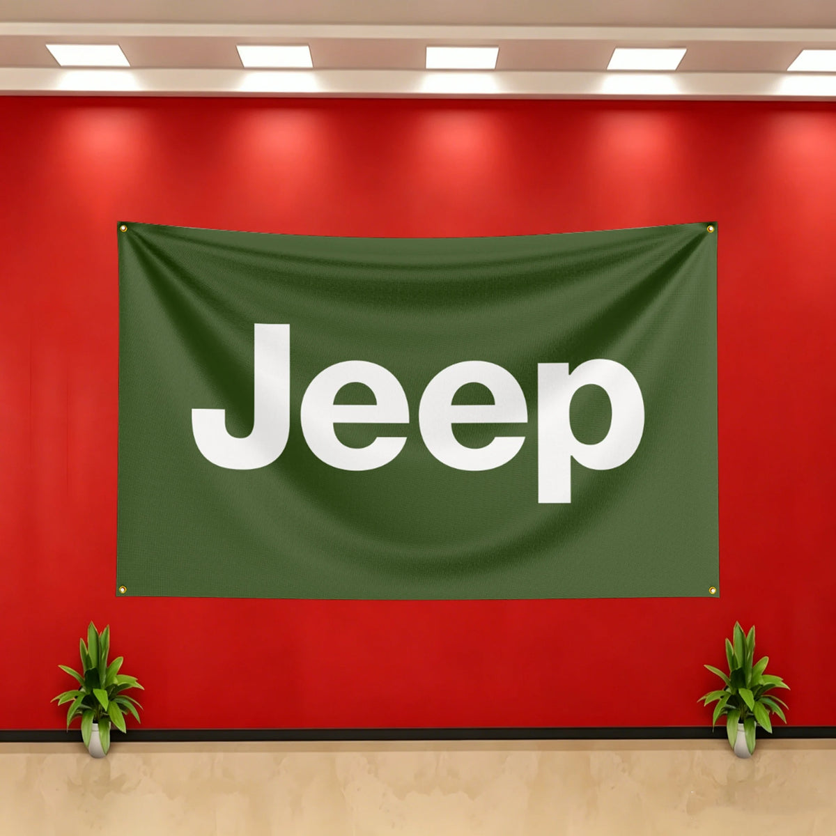 A dark green banner with the word Jeep in white lettering hangs on a red wall.