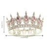 Topper en métal de couronne de cristal argenté avec accents de gemmes roses et une bande détaillée.