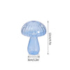 Vase décoratif en verre bleu clair en forme de champignon avec un large chapeau et un col étroit