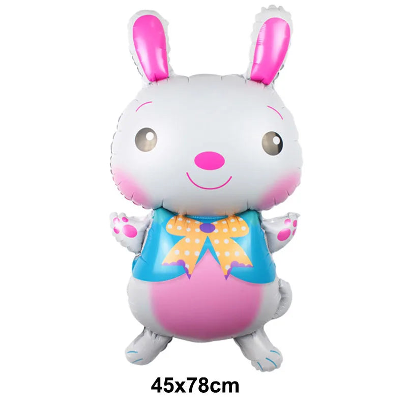 A cartoon white bunny foil balloon with pink accents and a blue bow.