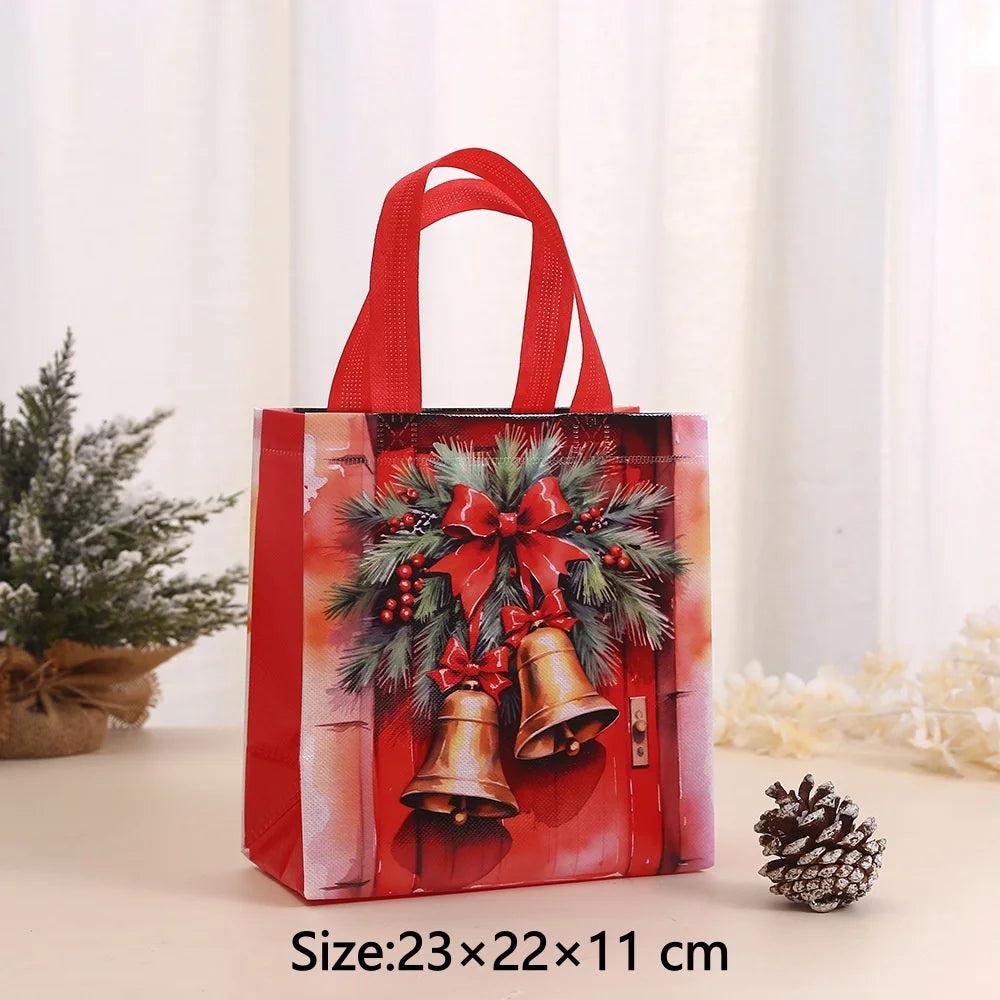 A red non-woven gift tote bag featuring a festive Christmas print with pine branches and bells.