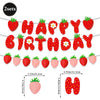 A set of strawberry birthday party decorations featuring an alphabet banner and cake toppers.