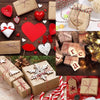 A collection of gift boxes and ribbons featuring red, white, and natural tones for crafting and holiday presents.