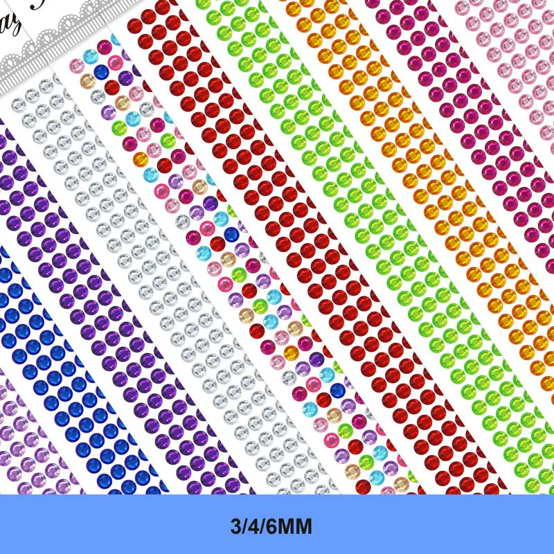 A close-up view of colorful self-adhesive rhinestones arranged in diagonal stripes.