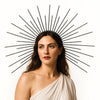 A woman wearing a celestial halo headband with gold and silver star accents.