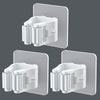 A white adhesive wall hook designed to hold mops and brushes, shown in various angles against a gray background.