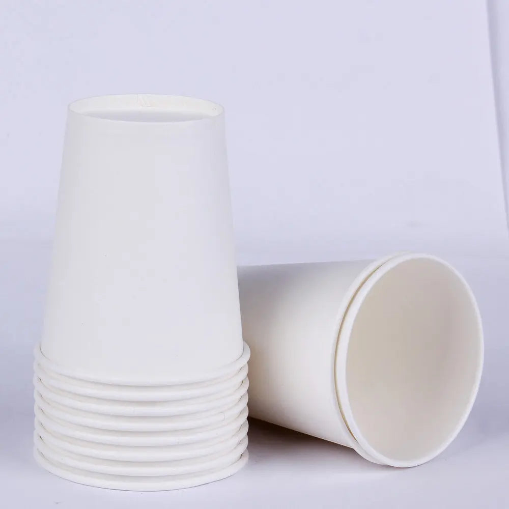 A stack of white disposable tableware cups and a single cup are shown against a white background.