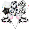 A set of black and white cow print balloons including a large number balloon, a star balloon, and several patterned balls.