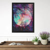 A framed piece of diamond art featuring a vibrant pink and purple moon against a dark background.