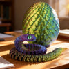 A vibrant green 3D movable rainbow snake fidget toy resting on a wooden surface.