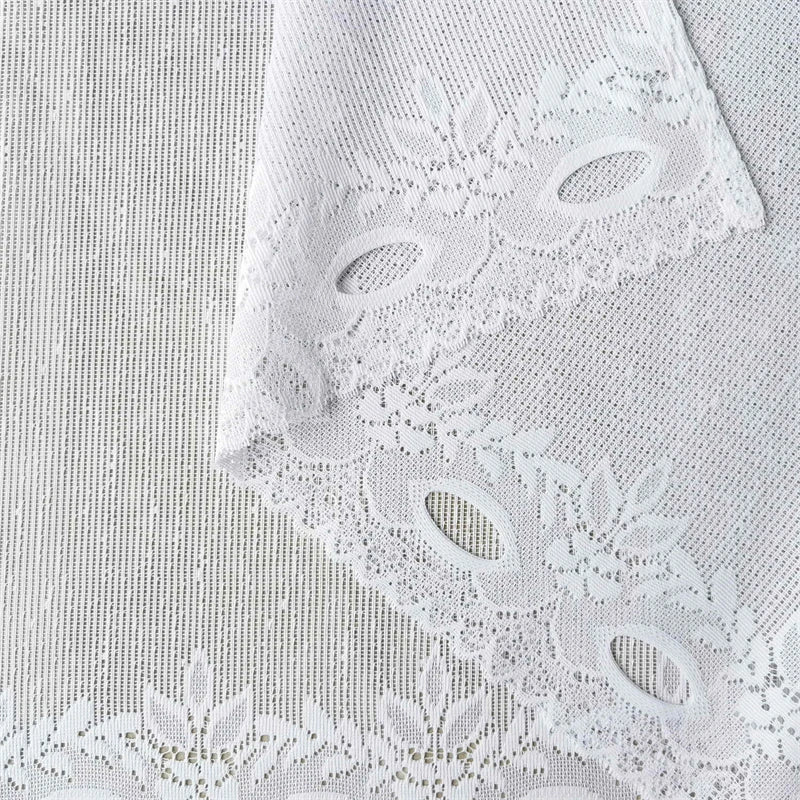 White lace mesh sheer curtain featuring decorative cutouts and a rod pocket.