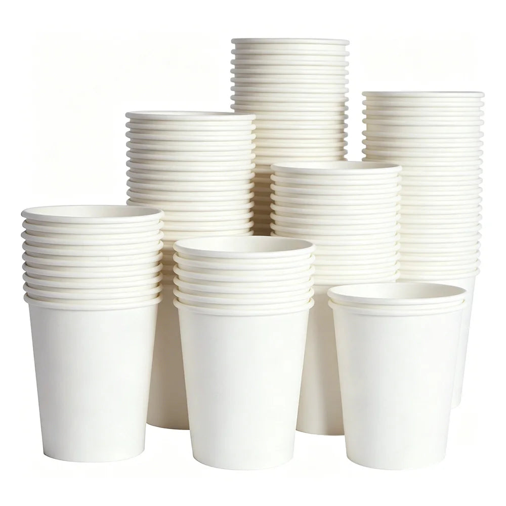 A stack of white disposable paper plates in various sizes and quantities.