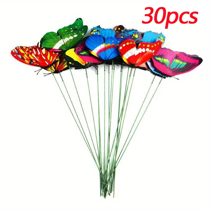 A set of colorful decorative butterfly garden stakes with green stems.