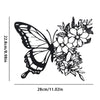Black metal butterfly wall decor featuring a detailed floral pattern.